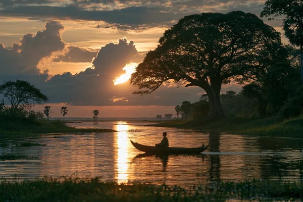 Sunset River With a Small Boat - Sea, Lakes & Water / Sky, Stars & Sunsets wallpaper