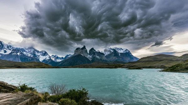 Blue Lake and Mountains under a Turbulent Sky - Sea, Lakes & Water / Nature & Landscape wallpaper