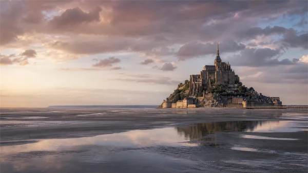 An Island Abbey Rising from the Tidal Flats - Orange 4K - Heritage & Ruins / Sea, Lakes & Water wallpaper