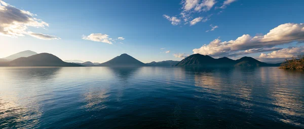 Mountains Reflected in a Clear Blue Lake - Blue Full HD - Sea, Lakes & Water / Nature & Landscape wallpaper